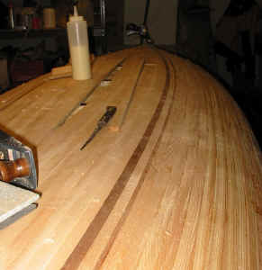 A sharp plane, a pencil and a sanding block make quick work of this.