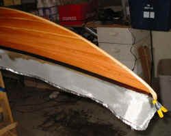 On the first glass layer, I had to cut the glass for the last inch at the bow so it would lay flat.