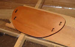 Epoxy won't stick to most plastics, so I place epoxied objects on top of PVC ring clamps to cure.